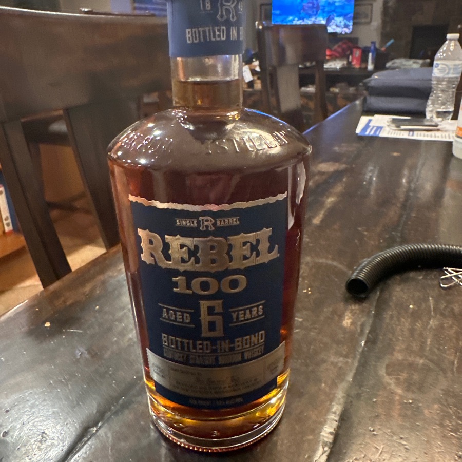 Rebel 100 Single Barrel Aged 6 Years Bottled in Bond Kentucky Straight Bourbon Whiskey