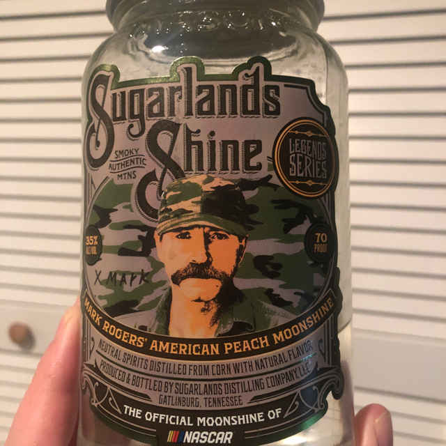 Sugarlands Shine Mark Rogers' American Peach Moonshine